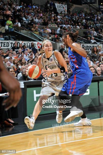 Becky Hammon of the San Antonio Silver Stars drives against Sheri Sam of the Detroit Shock in Game Two of the WNBA Finals on October 3, 2008 at AT&T...