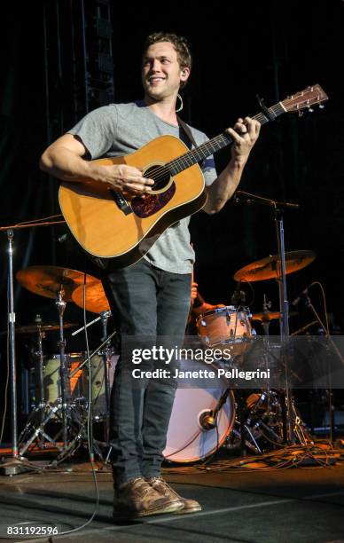 Phillip Phillips performs at Northwell Health at Jones Beach Theater on August 13, 2017 in Wantagh, New York.