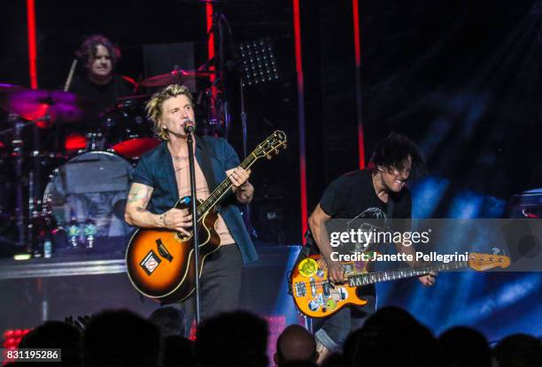 John Rzeznik and Robby Takac of the Goo Goo Dolls perform at Northwell Health at Jones Beach Theater on August 13, 2017 in Wantagh, New York.