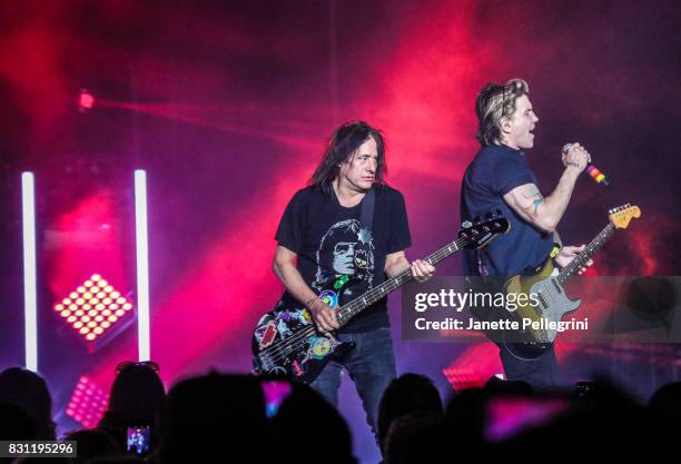 Robby Takac and John Rzeznik of the Goo Goo Dolls perform at Northwell Health at Jones Beach Theater on August 13, 2017 in Wantagh, New York.