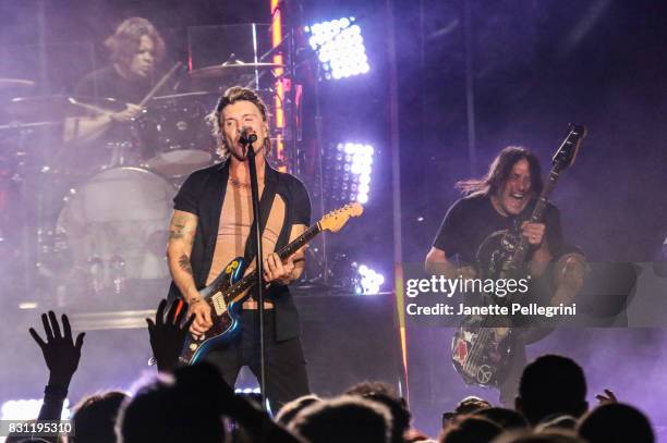 John Rzeznik and Robby Takac of the Goo Goo Dolls perform at Northwell Health at Jones Beach Theater on August 13, 2017 in Wantagh, New York.