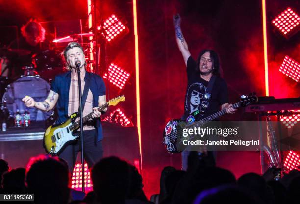 John Rzeznik and Robby Takac of the Goo Goo Dolls perform at Northwell Health at Jones Beach Theater on August 13, 2017 in Wantagh, New York.