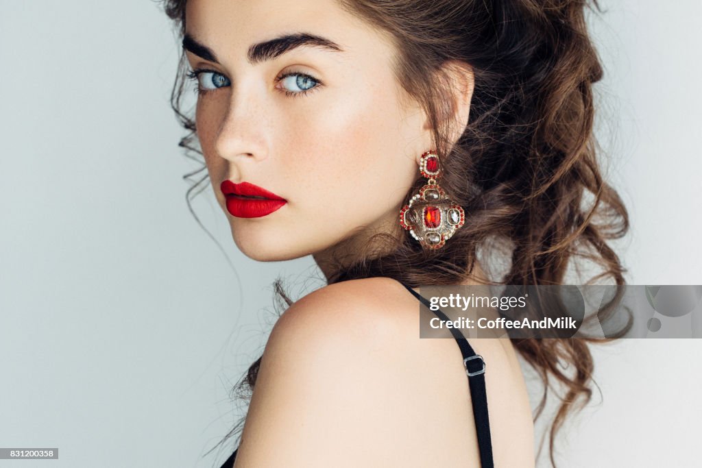 Studio shot of young beautiful woman
