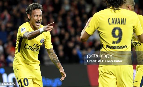 Paris Saint-Germain's Brazilian forward Neymar celebrates after scoring a goal during the French L1 football match Guingamp versus Paris...