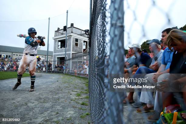 Christian Molfetta warms up during game one of the Cape Cod League Championship Series against the Bourne Braves at Stony Brook Field on August 11,...