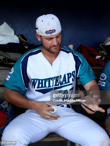 Julian Infante of the Brewster Whitecaps wraps his wrist before game three of the Cape Cod League Championship Series against the Bourne Braves at...