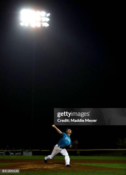 Drew Reveno of the Brewster Whitecaps pitches against the Bourne Braves during game two of the Cape Cod League Championship Series at Doran Park on...