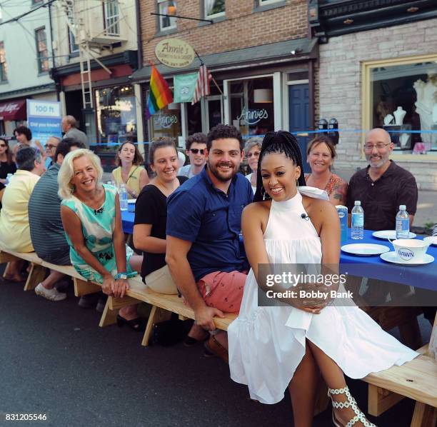 Tia Mowry hosts "Family Dinner with Dawn" inviting the town of Lambertville to dinner taking care of the nearly 6,000 dishes with one bottle of Dawn...