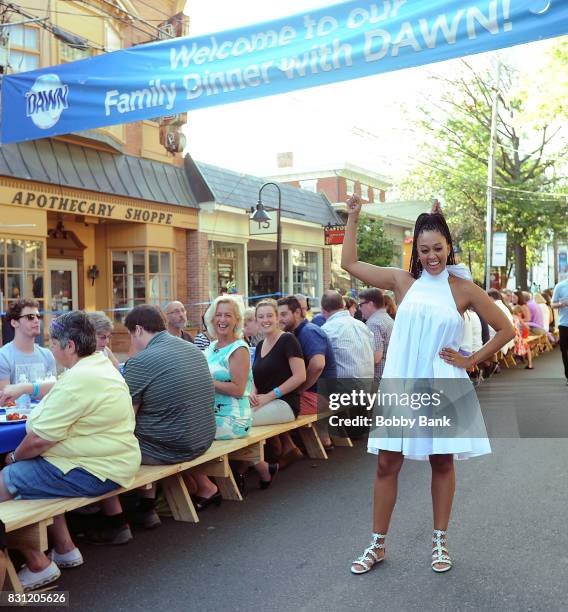 Tia Mowry hosts "Family Dinner with Dawn" inviting the town of Lambertville to dinner taking care of the nearly 6,000 dishes with one bottle of Dawn...