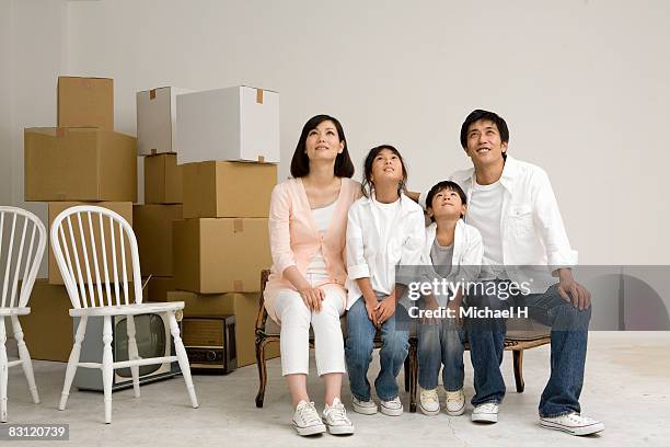 family's portrait,the time of move - michael sit stock pictures, royalty-free photos & images