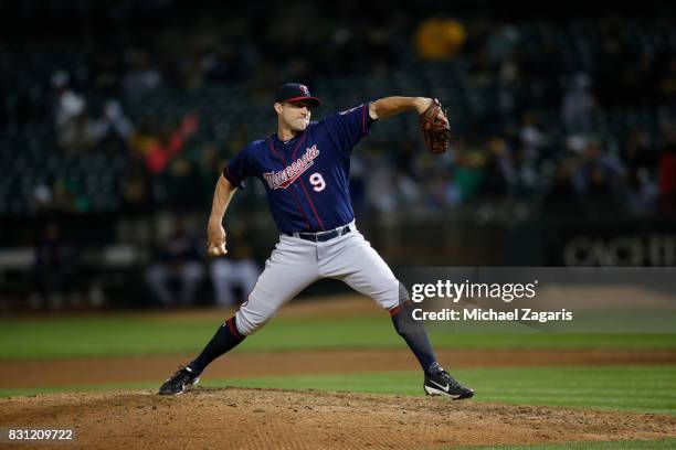 Matt Belisle of the Minnesota Twins pitches during the game against the Oakland Athletics at the Oakland Alameda Coliseum on July 28, 2017 in...