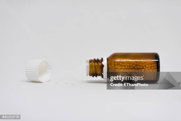 homeopathic pills (globules) - globuli stock-fotos und bilder