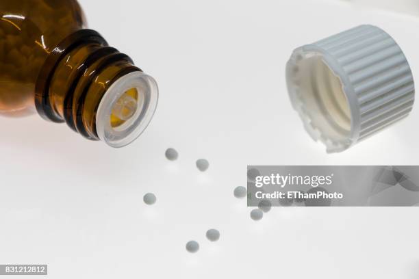 homeopathic pills (globules) - globuli stock-fotos und bilder