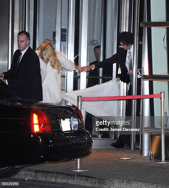 Beth Ostrosky and Howard Stern depart Le Cirque after their wedding on October 3, 2008 in New York City.