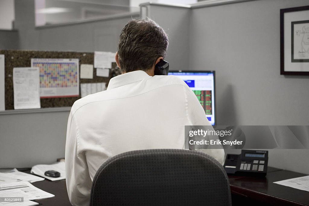Man in office on the telephone