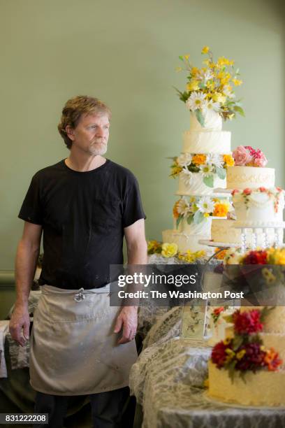 Jack Phillips stands for a portrait near a display of wedding cakes in his Masterpiece Cakeshop in Lakewood, CO on Thursday, September 1, 2016. Jack...