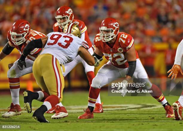Offensive tackle Eric Fisher of the Kansas City Chiefs gets set on the line against the San Francisco 49ers during the first half of a preseason game...