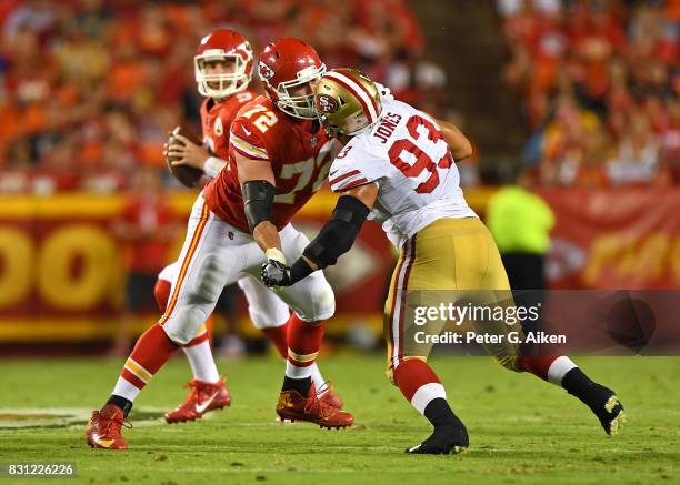 Offensive tackle Eric Fisher of the Kansas City Chiefs blocks defensive tackle Chris Jones of San Francisco 49ers during the first half of a...