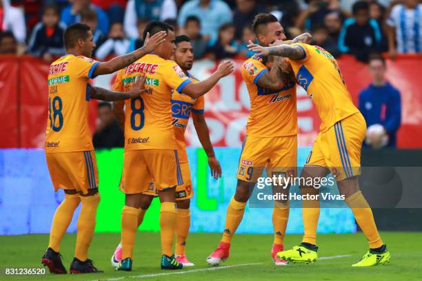 Andre Gignac of Tigres celebrates with Eduardo Vargas after scoring the first goal of his team during the 4th round match between Pachuca and Tigres...