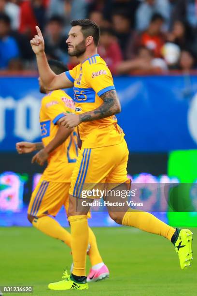 Andre Gignac of Tigres celebrates with after scoring the first goal of his team during the 4th round match between Pachuca and Tigres UANL as part of...