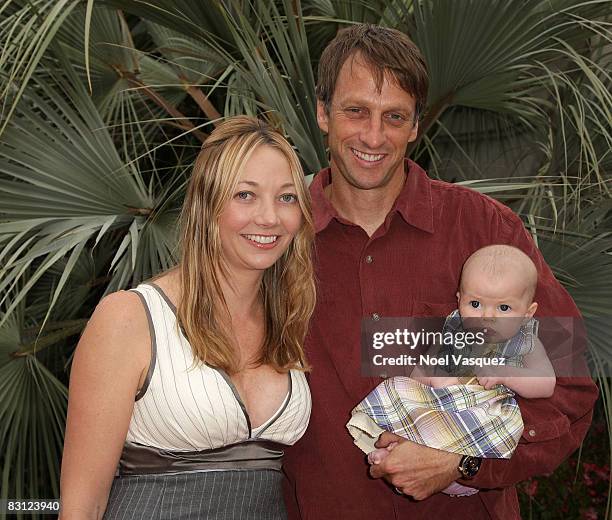 Skateboarder Tony Hawk, his wife Lhotse Merriam and baby daughter Kadence Clover Hawk attend the "Ante Up For Autism" benefit event at the St. Regis...