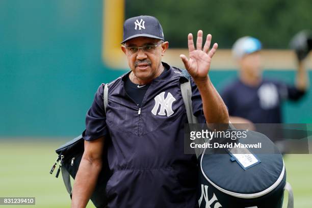 First Base Coach Tony Pena of the New York Yankees walks to the dugout before the start of the game against the Cleveland Indians at Progressive...