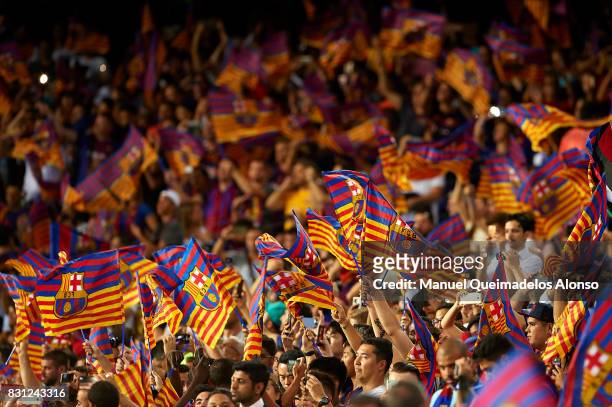 Barcelona fans suport their team during a warm up prior to the Supercopa de Espana Supercopa Final 1st Leg match between FC Barcelona and Real Madrid...