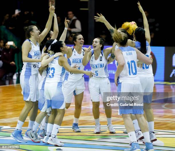 Players of Argentina celebrate after winning the match between Argentina and Puerto Rico as part of the FIBA Women's AmeriCup Semi Final at Obras...