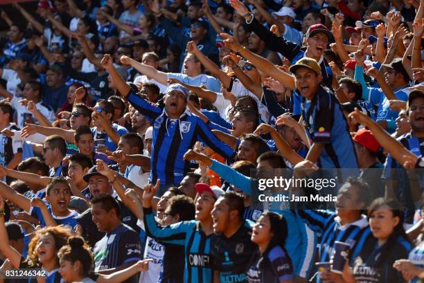 Fans of Queretaro cheer for their teaml during the 4th round match between Queretaro and Morelia as part of the Torneo Apertura 2017 Liga MX at...