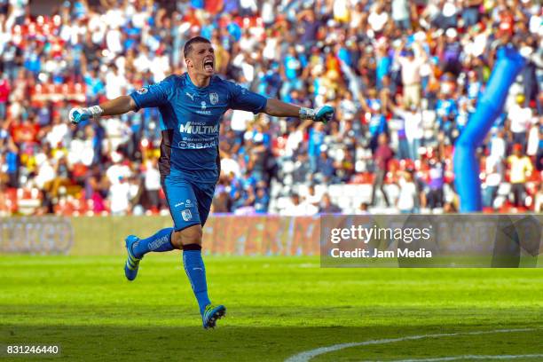 Tiago Volpi Goalkeeper of Queretaro celebrates his team second goal during the 4th round match between Queretaro and Morelia as part of the Torneo...