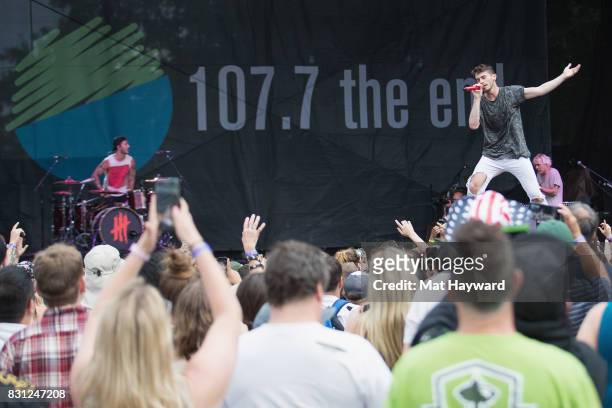 Singer David Boyd of New Politics stands on the crowd while performing during the Summer Camp music festival hosted by 107.7 the End at Marymoor Park...