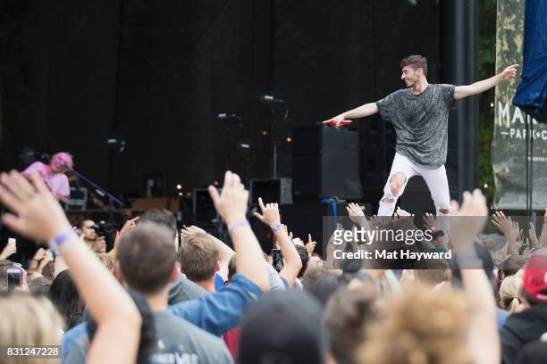 Singer David Boyd of New Politics stands on the crowd while performing during the Summer Camp music festival hosted by 107.7 the End at Marymoor Park...