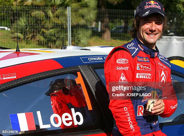 France's Sebastien Loeb waits in the technical for the start of the second stage of the 44th Rally of Catalonia in El Molar near Tarragona on October...
