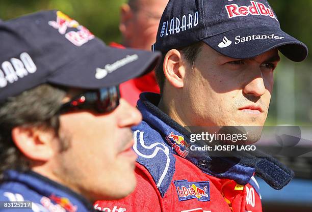 Spain's Daniel Sordo and co-driver Marc Marti wait the technical area during the second stage of the 44 th Rally of Catalonia in El Molar near...
