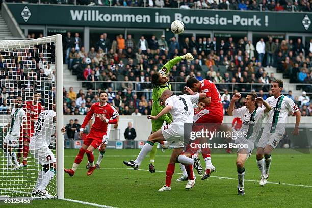 Goalkeeper Christopher Heimeroth blocks the ball infront of Youssuf Mohamad of Koeln during the Bundesliga match between Borussia Moenchengladbach...