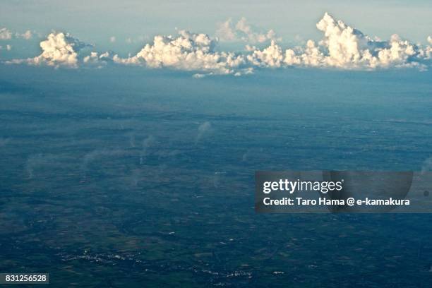 thunder clouds on suphan buri province in thailand daytime aerial view from airplane - suphan buri province stock-fotos und bilder