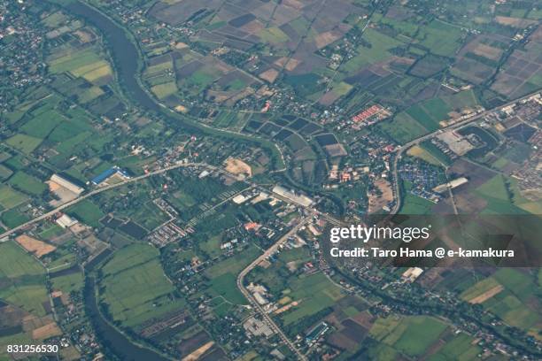 suphan buri province in thailand daytime aerial view from airplane - suphan buri province stock-fotos und bilder