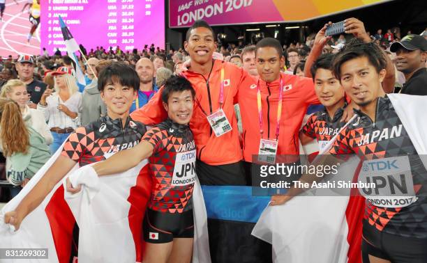 Shuhei Tada, Shota Iizuka, Yoshihide Kiryu, Abdul Hakim Sani Brown, Aska Cambridge and Kenji Fujimitsu of Japan celebrate winning bronze in the Men's...