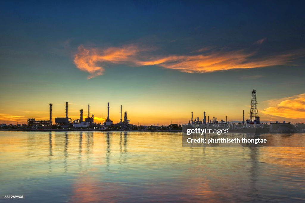 Oil refinery and petrochemical plant at sunrise.- Oil and gas industry