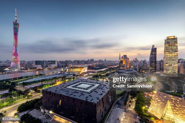 sunset view of guangzhou downtown district - guangzhou stock pictures, royalty-free photos & images