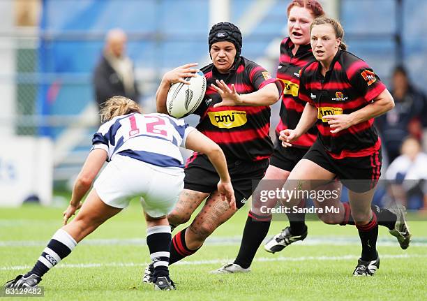 Val Davis of Canterbury looks to fend off Teresa Te Tamaki of Auckland during the Women`s NPC Rugby Final match between Auckland and Canterbury at...