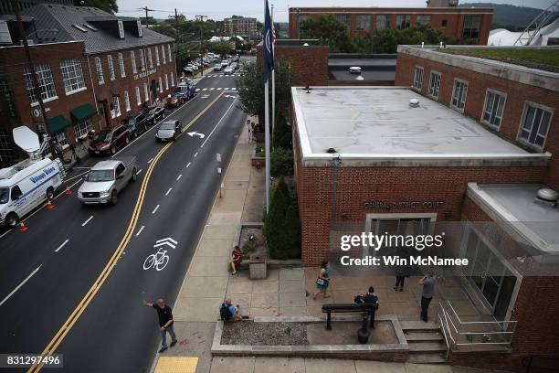 Reporters enter of the Charlottesville General District Court before a scheduled appearance via video link for James Alex Fields Jr. August 14, 2017...