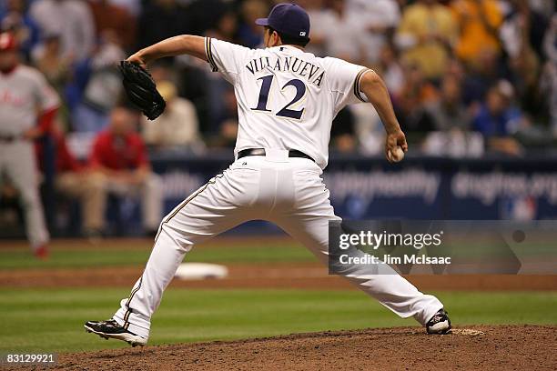 Carlos Villanueva of the Milwaukee Brewers throws a pitch against the Philadelphia Phillies grounded out for the final out in the top of the sixth...