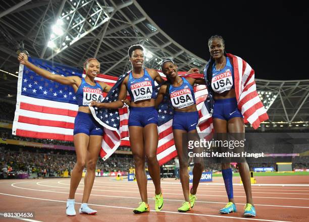 Quanera Hayes, Allyson Felix, Shakima Wimbley and Phyllis Francis of the United States celebrate winning gold in the Women's 4x400 Metres Relay final...