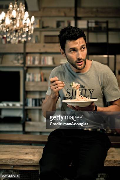 Model Noah Mills is photographed for Sport & Style, on September 24, 2012 in Milan, Italy.