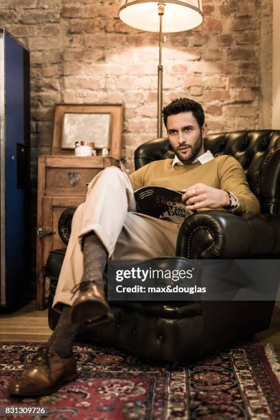 Model Noah Mills is photographed for Sport & Style, on September 24, 2012 in Milan, Italy.