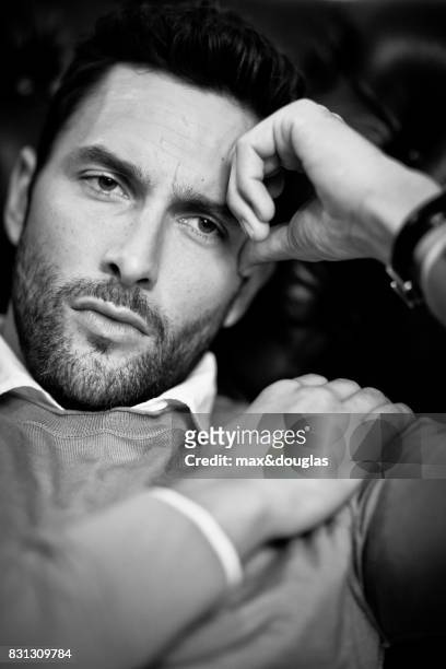 Model Noah Mills is photographed for Sport & Style, on September 24, 2012 in Milan, Italy.
