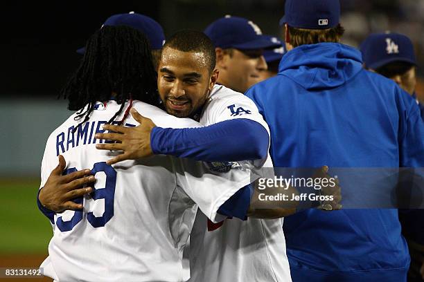 James Loney and Manny Ramirez of the Los Angeles Dodgers celebrate after defeating the Chicago Cubs in Game Three of the NLDS during the 2008 MLB...