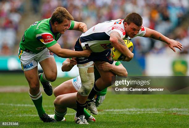 Josh McGuire of the Broncos is tackled during the Under 20's Toyota Cup Final match between the Canberra Raiders and the Brisbane Broncos at ANZ...