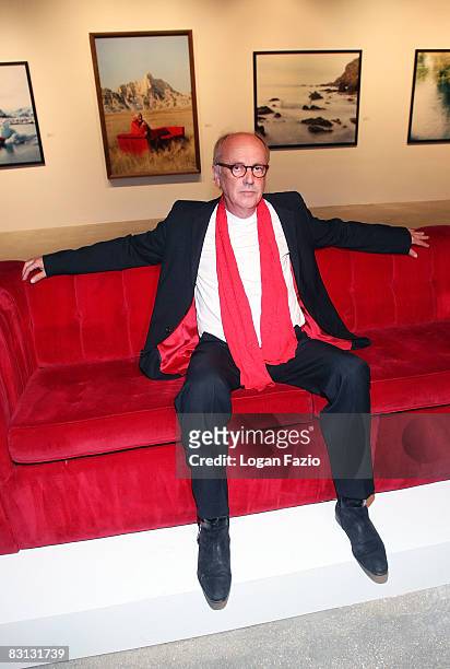 Fine art photographer Horst Wackerbarth poses on "The Red Couch", the inaugural exhibition of photographic artwork by Wackerbarth at Wolfgang Roth &...